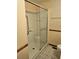 Bathroom shower with glass door and built-in seat at 407 White Oak Way, Sarasota, FL 34237