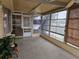 Inviting sunroom with neutral tones, great views, and comfortable spot for relaxation at 407 White Oak Way, Sarasota, FL 34237