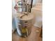 Water heater featuring modern fixtures and energy-efficient design for reliable hot water supply at 407 White Oak Way, Sarasota, FL 34237