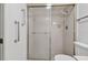 Simple bathroom with a shower, toilet and grab bars at 3438 Wood Owl Cir # 275, Bradenton, FL 34210