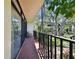 Private balcony with seating and tranquil courtyard views at 3438 Wood Owl Cir # 275, Bradenton, FL 34210