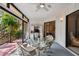 Covered lanai with outdoor seating and view of nature at 3438 Wood Owl Cir # 275, Bradenton, FL 34210
