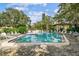 Inviting community pool with plenty of lounge chairs at 3438 Wood Owl Cir # 275, Bradenton, FL 34210