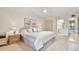 King-size bed, ensuite bathroom access, and ample closet space at 3438 Wood Owl Cir # 275, Bradenton, FL 34210
