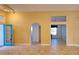 Bright living room with tile floors and access to backyard patio at 7421 Fairlinks Ct, Sarasota, FL 34243