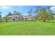 Single-Gathering home with lush landscaping at 7430 Weeping Willow Dr, Sarasota, FL 34241