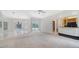 Bright and open living room with access to pool and bar area at 7430 Weeping Willow Dr, Sarasota, FL 34241