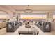 Spacious living room with ocean view and comfortable seating at 70 Avenida Veneccia # 402, Sarasota, FL 34242