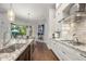 Updated kitchen featuring granite countertops and stainless steel appliances at 7336 Haddington Cv, Bradenton, FL 34202