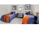 Charming bedroom with twin beds, ample storage and natural light at 7336 Haddington Cv, Bradenton, FL 34202