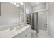 Well-lit bathroom with updated vanity, bathtub and shower at 7336 Haddington Cv, Bradenton, FL 34202