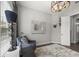 Bright home office with window seating and a large decorative mirror at 7336 Haddington Cv, Bradenton, FL 34202