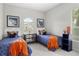 Charming bedroom with twin beds, ample storage and natural light at 7336 Haddington Cv, Bradenton, FL 34202