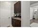 Bright laundry room with washer, dryer and cabinets at 7336 Haddington Cv, Bradenton, FL 34202
