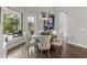 Casual breakfast nook with a round table and chairs near a window at 7336 Haddington Cv, Bradenton, FL 34202