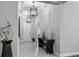 Elegant entryway featuring hardwood floors, high ceilings, and unique decor at 7336 Haddington Cv, Bradenton, FL 34202