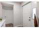Bright entryway with white doors and wood-look floors at 1712 Lakeside Dr # 1712B, Venice, FL 34293