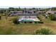 Aerial view of community pool and surrounding grounds at 1712 Lakeside Dr # 1712B, Venice, FL 34293