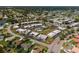Wide aerial view of community and surrounding neighborhood at 1712 Lakeside Dr # 1712B, Venice, FL 34293