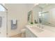 Clean bathroom with white subway tile, modern vanity, and glass shower at 14359 Skipping Stone Loop, Parrish, FL 34219