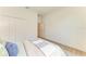 Light and airy bedroom with wood floors and built-in closet at 14359 Skipping Stone Loop, Parrish, FL 34219