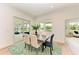 Bright dining area with sliding glass doors leading to the backyard and pool at 14359 Skipping Stone Loop, Parrish, FL 34219
