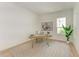 Bright home office features hardwood floors and a stylish work area at 14359 Skipping Stone Loop, Parrish, FL 34219