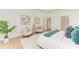 Bright main bedroom with a king-size bed and sitting area at 14359 Skipping Stone Loop, Parrish, FL 34219