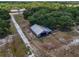 Barn with metal roof in a wooded area at 15440 County Road 675, Parrish, FL 34219