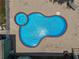 Overhead view of kidney-shaped pool and spa at 15440 County Road 675, Parrish, FL 34219