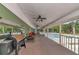 Spacious screened porch with pool view and outdoor grill at 15440 County Road 675, Parrish, FL 34219