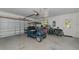 Spacious garage with golf cart and bicycles at 15440 County Road 675, Parrish, FL 34219