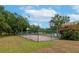 Private basketball court with fenced perimeter at 15440 County Road 675, Parrish, FL 34219
