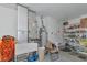 Garage with storage shelves and HVAC units at 15440 County Road 675, Parrish, FL 34219