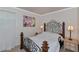 Serene bedroom with an ornate bed frame and nightstands at 15440 County Road 675, Parrish, FL 34219