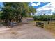 Long driveway leading to a ranch style home at 15440 County Road 675, Parrish, FL 34219