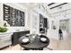 Stylish dining area with custom wine storage and easy access to the modern kitchen at 1805 Goldenrod St, Sarasota, FL 34239