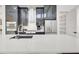 Gourmet kitchen with custom cabinets, stainless steel appliances, and a large center island at 1805 Goldenrod St, Sarasota, FL 34239