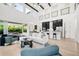Airy and elegant living room featuring high ceilings, lots of light, and open floor plan perfect for entertaining at 1805 Goldenrod St, Sarasota, FL 34239
