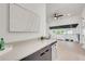 Modern loft featuring neutral colored walls, bar area and iron railings at 1805 Goldenrod St, Sarasota, FL 34239
