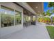 Lovely outdoor living space featuring a dining area, built-in grill, and a lounge area with chairs at 1805 Goldenrod St, Sarasota, FL 34239