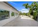 Spacious roof deck with white tiled floor and a view to the street at 1805 Goldenrod St, Sarasota, FL 34239