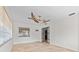 Bright living room with tan tile flooring at 358 Suwanee Ave, Sarasota, FL 34243