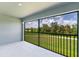 Spacious balcony overlooking a lush green landscape at 12520 Galapagos Ct # 207, Venice, FL 34293