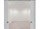 Empty bedroom with gray carpeting and bright white walls at 12520 Galapagos Ct # 207, Venice, FL 34293