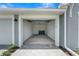Empty garage interior with open garage door at 12520 Galapagos Ct # 207, Venice, FL 34293