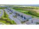 Aerial view of multiple homes and a golf course at 12520 Galapagos Ct # 207, Venice, FL 34293