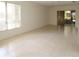 Bright living room with tile floors and sliding doors at 1213 Tallywood Dr # 7007, Sarasota, FL 34237
