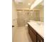 Bright bathroom with shower/tub combo and wood vanity at 1213 Tallywood Dr # 7007, Sarasota, FL 34237