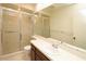 Clean bathroom with shower/tub combo, vanity, and mirror at 1213 Tallywood Dr # 7007, Sarasota, FL 34237